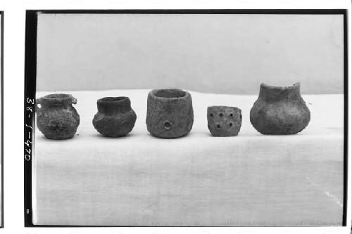 Miniature vessels. L: 1730, Str. A-V, above floor, E court. 2: 4538 Str. A-V, be