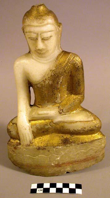 Sculpture, seated Buddha, gold leaf robe and head, pigmented base