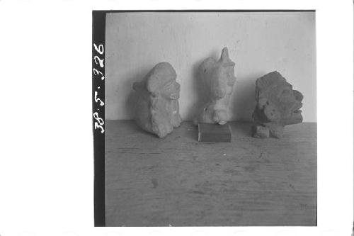 1 animal figurine, 1 human figurine, 1 human head (right profile)
