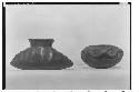 Clay specimens.  LEFT: Small jar.  Shape of double cornucopia. - RIGHT: Frog eff