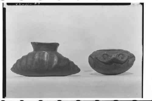 Clay specimens.  LEFT: Small jar.  Shape of double cornucopia. - RIGHT: Frog eff