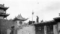 People standing on roof of building