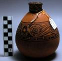 Gourd with coiled reed stopper, light brown with etched design, +