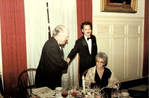 Gordon Willey shaking hands with Jeremy Sabloff at dinner in honor of Gordon Wil