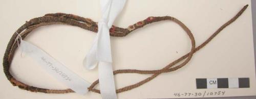 Organic, fiber, sling, braided cordage, central section, netted, embroidered