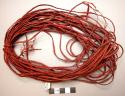 4-strand red braided belting worn by men around waist to hold up "sampan". +