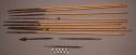 Arrow, wood and metal points, one missing, reed shafts, fiber wraps