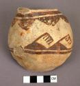 One half of a handled pottery jar. San Bernardino black-on-yellow