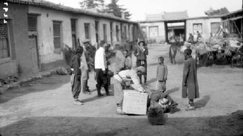 People in front of buildings