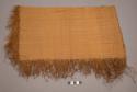 Piece of tan linen fringed on 3 sides