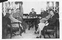 Gordon Willey (third from left) and others seated around a table