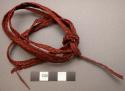 Red woven man's belt ("dau"), made by women