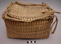 Oblong covered basket
