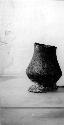 Ceramic pedestal vase, chipped rim and base