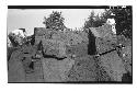 Men working on east side of pyramid 5; Mound A