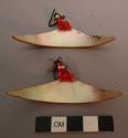 Pair of Men's mother-of-pearl ear ornaments (tatanyon); lunate-shape +