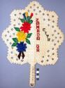 Plaited pandamus leaf fan, with felt flowers, felt lettering says: Zamboa, Ga. C
