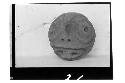 Solid head of brown clay. Cut off square at back of heads from Uxmal in MA1