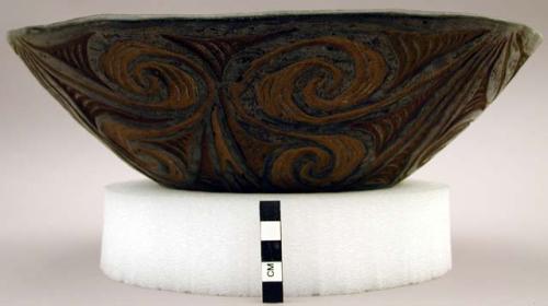 Bowl with carved and painted design