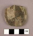 Worked sherd (black/white)