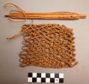 Small bag in process with netting needles, guarra-guarra