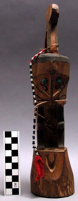 Carved wooden house idol - human effigy