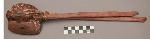 Ceremonial stone axe - mounted in wooden handle, both rubbed all over with ochre