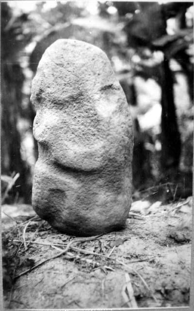 Sculptured stone human figure-front  view