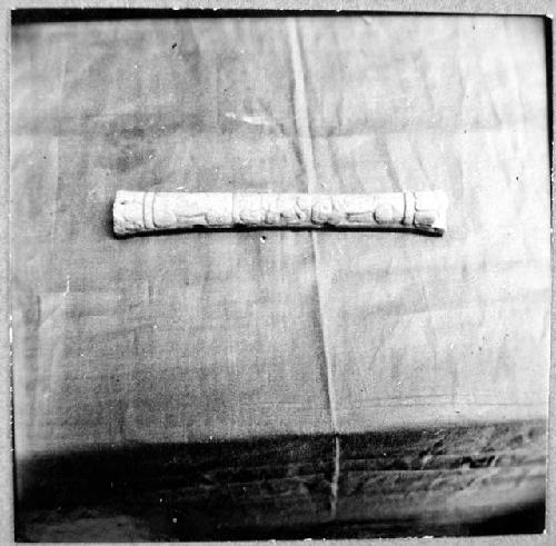 Cat. No. 3234, carved bone tube