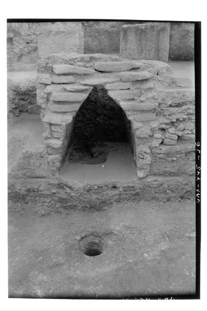 A-V: looking E. at section thru Burial 29. Notice chultun in foreground