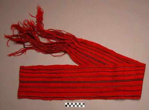 Sash, woven red wool, black and tan stripes, fringed ends