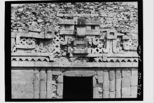 Front view of mask, Structure 1; East wing; West facade