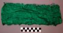 Green cloth scrap, (silk?); 1 of 6 scraps.