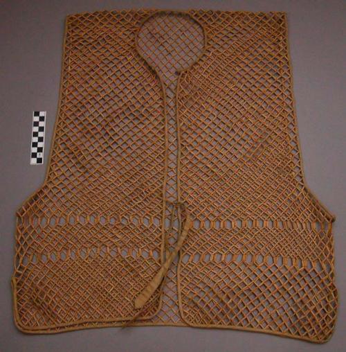 Netted garment, sections of cane strung on cord