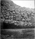 Stone wall fill, North balustrade and fallen stones, West side of C. Str.