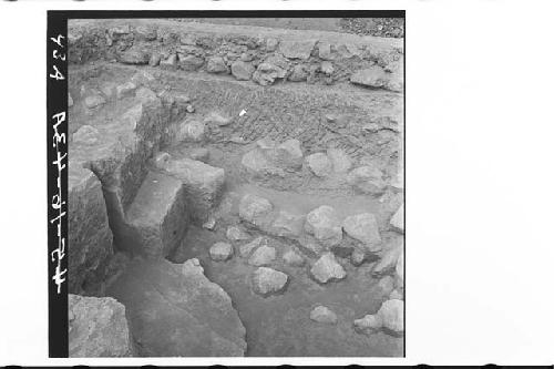 Panorama of detail of boulders inside fill of structure. From E, downward. Str.