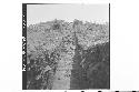 Looking W along trench at core of top of central str. Central structure (md. 1)