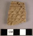 2 potsherds showing indented and plain corrugation, incised line, and punctate d