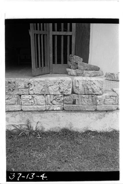 Stones from hieroglyphic frieze with seated figures