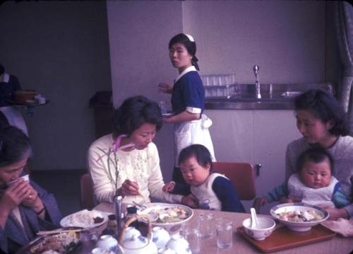 Tokyo, mothers and children at restaurant