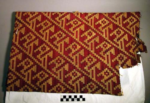 Mantle, weft-patterned