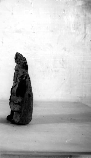 Ceramic figurine, standing anthropomorph, hands up