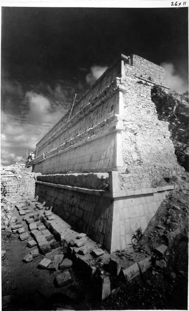 T. of Wars. Looking W. along S. side of pyramid after repair of sloping elements