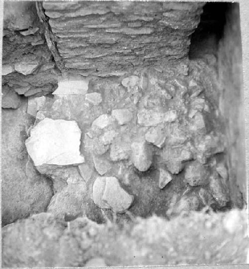 Last phase stone fill at floor level of sanctuary. Looking down to N.