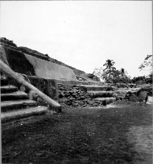 Looking West at broken profile of repaired North steps of various phases.