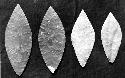 Flint blades and pyrite plaque found in large slate ware jar, 4 (cat. 1850)