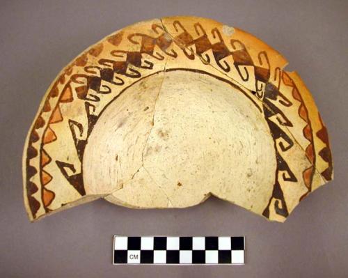 Sherds of pottery plate, ring base. San Bernardino polychrome