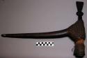 Ax used for chopping trees; also for injuring women, handle 16  1. wood. Tightly