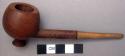 Carved wooden pipe with stem, length: 12.6 cm.