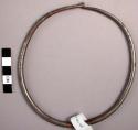 Iron neck ring, plain with decorated lines